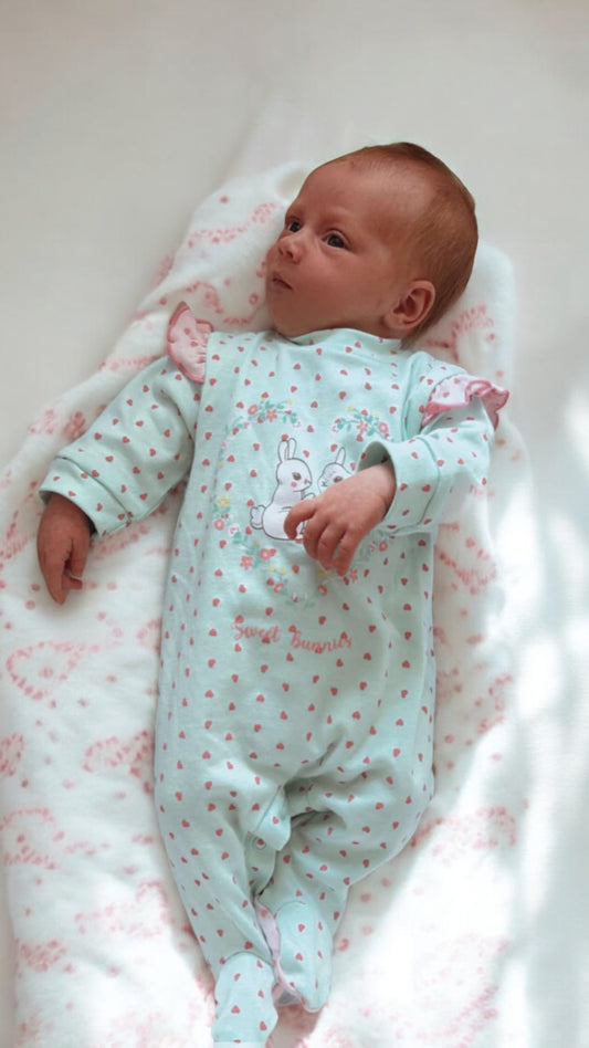 Baby sleep suit with frill shoulder and heart design