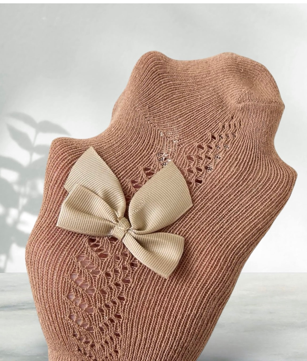 Brown tights, Spanish style with bow