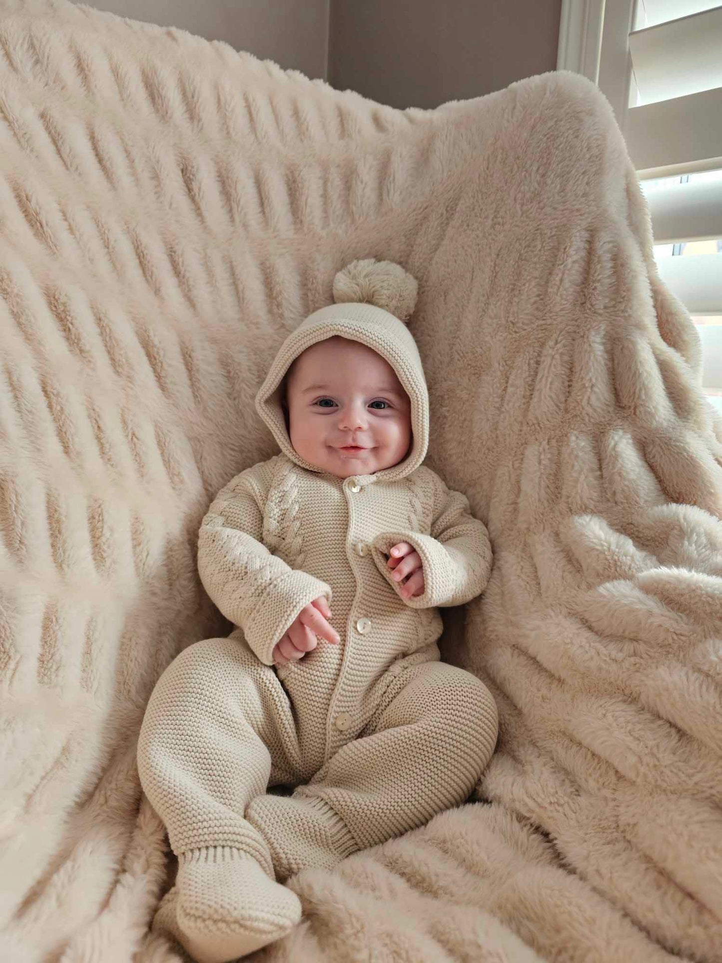 Taupe knitted hooded pram suit