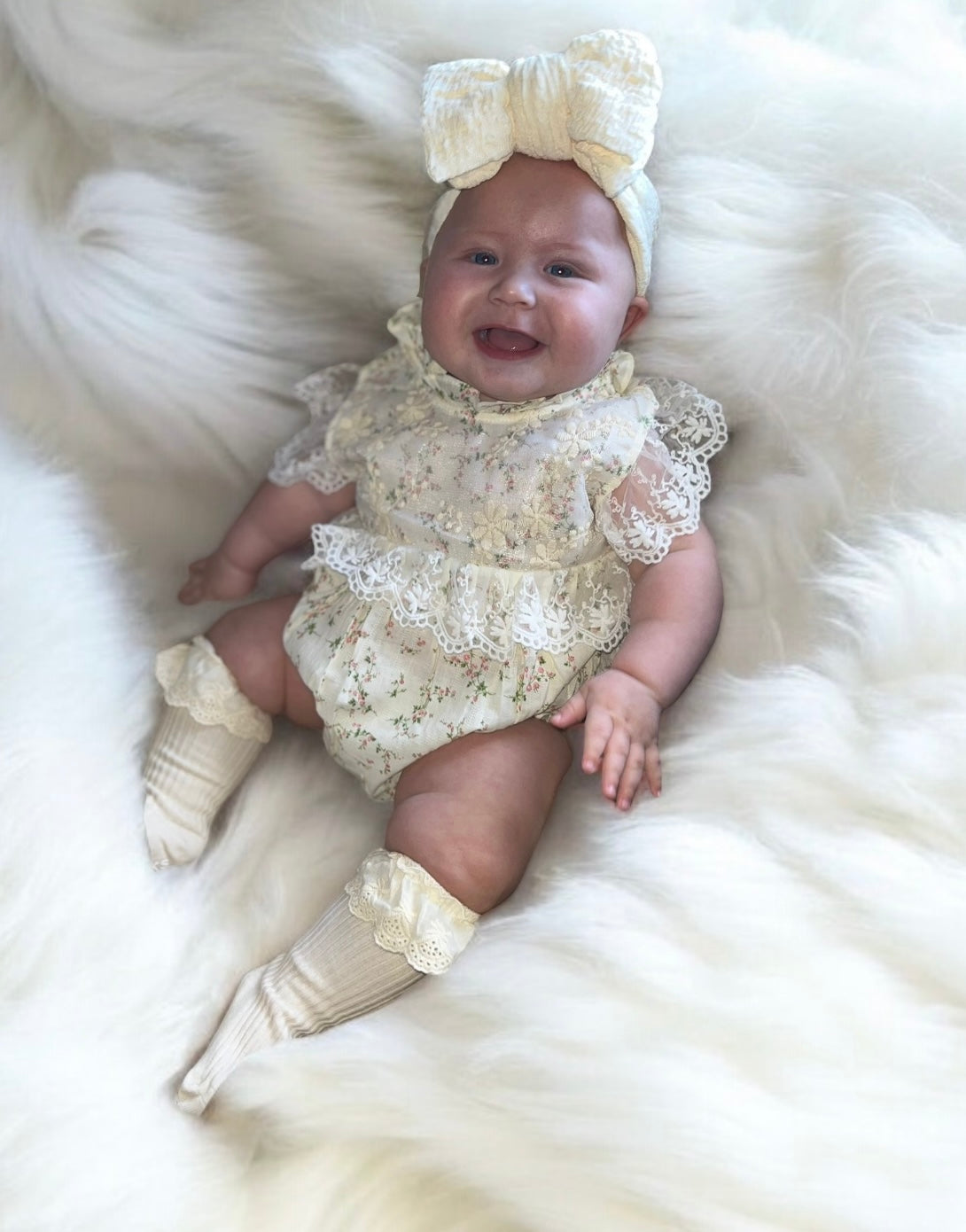 Beautiful baby girl romper with lace frill detail.