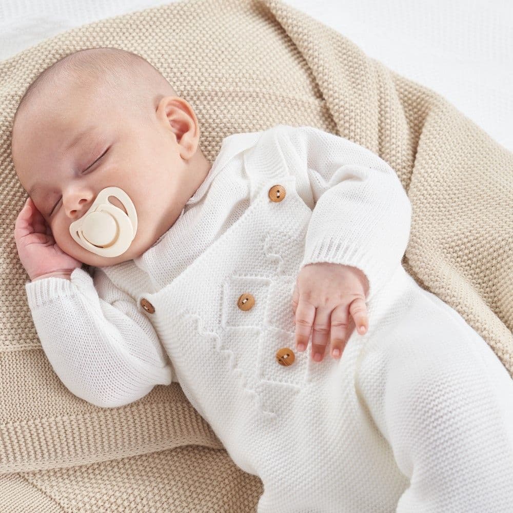 White knitted dungaree and white top