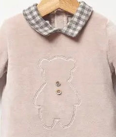 Close-up of the embroidered bear detail on the soft velvet footed baby onesie