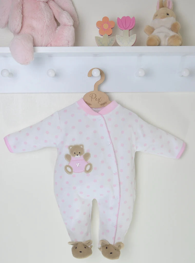 Cute velour baby girl sleepsuit with bunny feet.